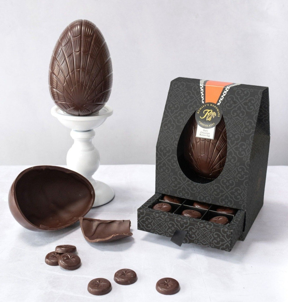 Chocolate egg made in dark chocolate with dark luxury chocolate buttons